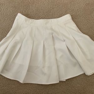 White pleated skirt
